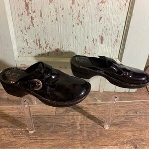 Women’s BOC by Born black leather slip on clogs with buckle